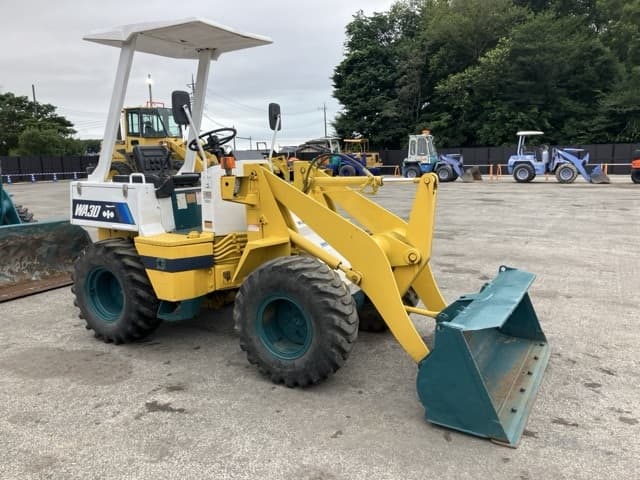 MINI WHEEL LOADER — Auction (lot 8451-380)