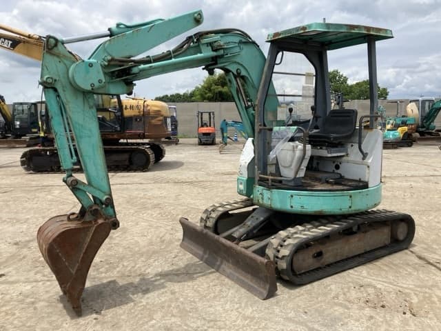 MINI EXCAVATOR — Auction (lot 8451-407)