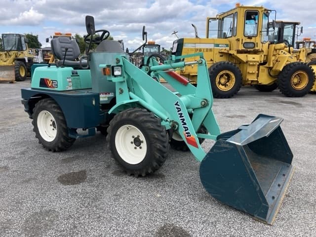 MINI WHEEL LOADER — Auction (lot 8451-489)