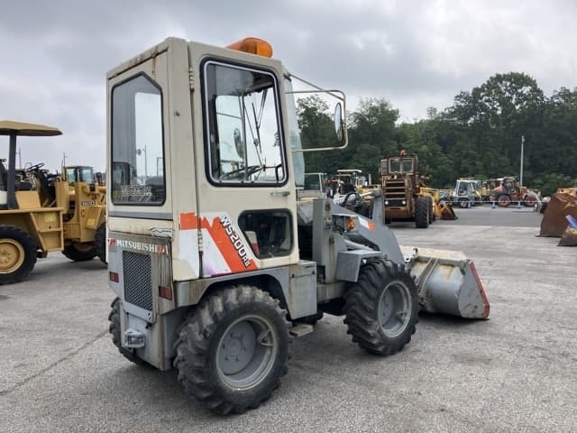 MINI WHEEL LOADER — Auction (lot 8451-77)
