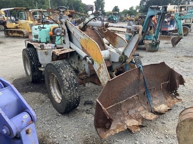 MINI WHEEL LOADER — Auction (lot 8451-831)