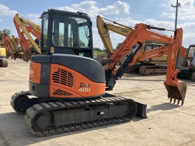MINI EXCAVATOR — Auction (lot 8456-108)