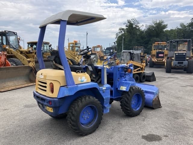 MINI WHEEL LOADER — Auction (lot 8456-329)