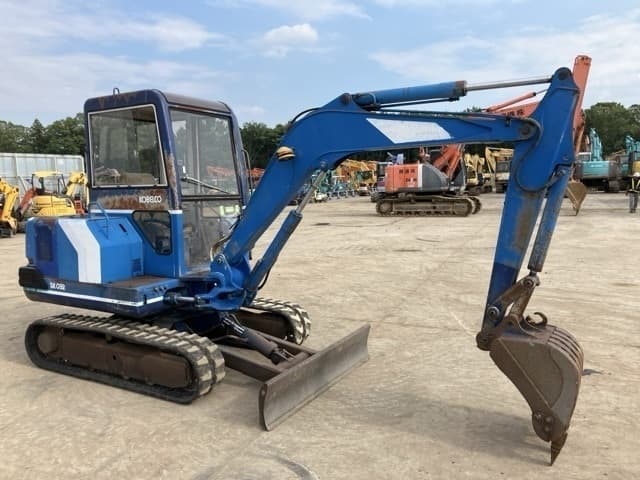 MINI EXCAVATOR — Auction (lot 8456-383)