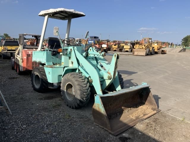 MINI WHEEL LOADER — Auction (lot 8456-804)