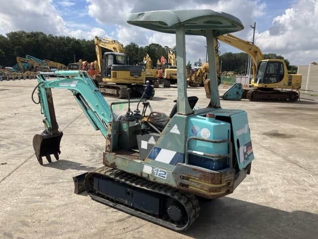 MINI EXCAVATOR — Auction (lot 8457-137)