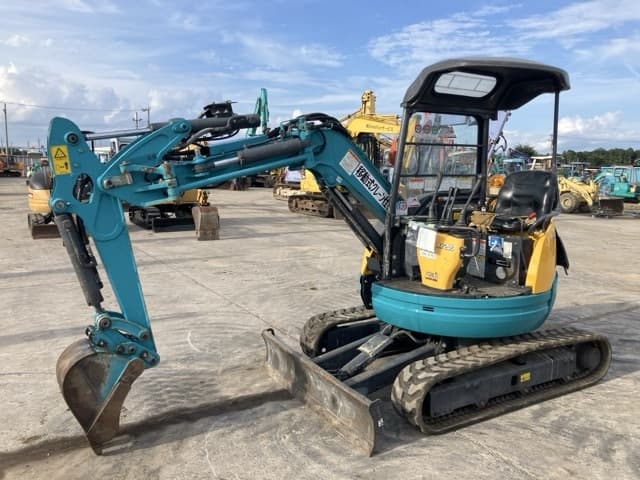 MINI EXCAVATOR — Auction (lot 8457-174)