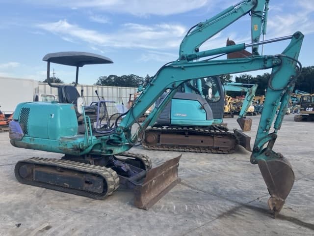 MINI EXCAVATOR — Auction (lot 8457-209)