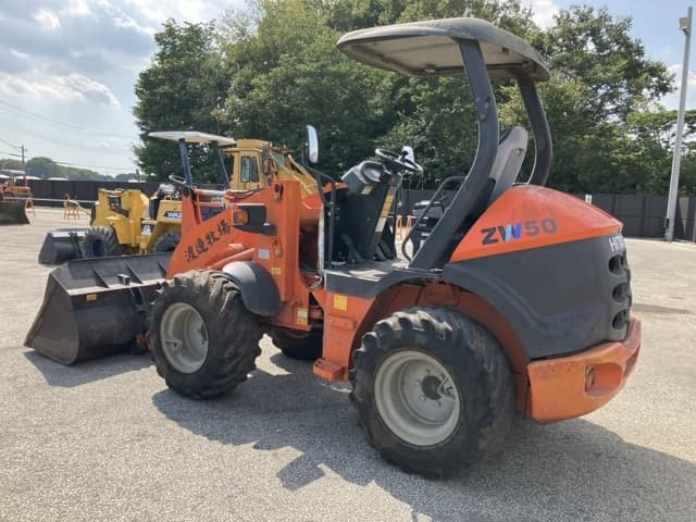 MINI WHEEL LOADER — Auction (lot 8457-297)