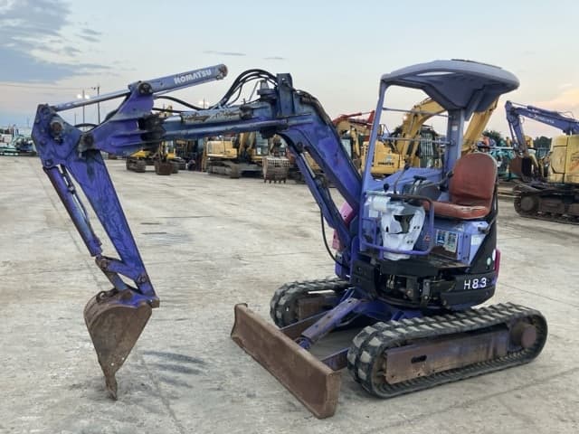 MINI EXCAVATOR — Auction (lot 8457-323)