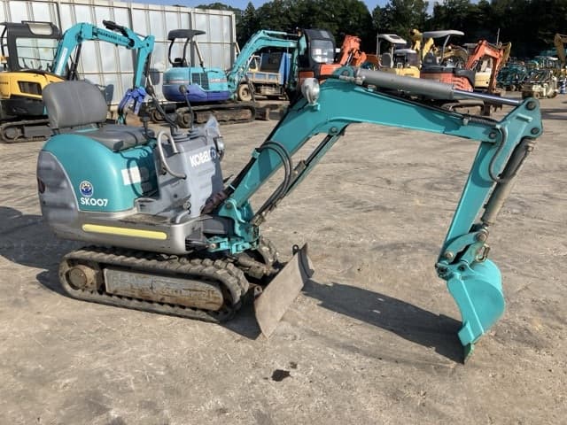 MINI EXCAVATOR — Auction (lot 8457-324)