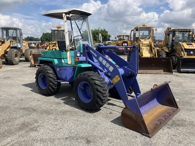 MINI WHEEL LOADER — Auction (lot 8457-38)