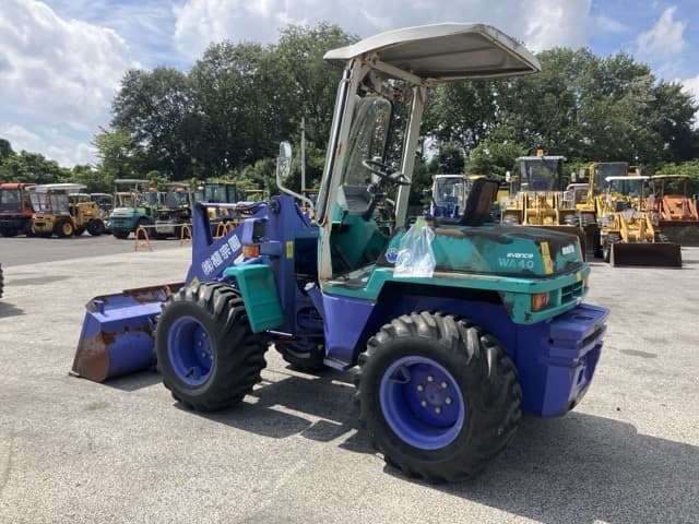MINI WHEEL LOADER — Auction (lot 8457-38)