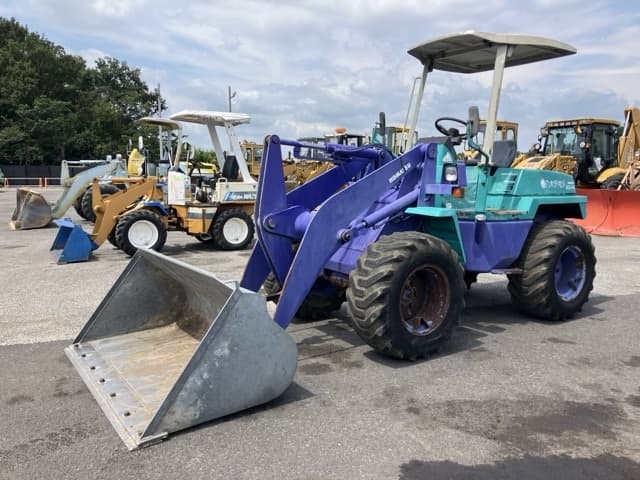MINI WHEEL LOADER — Auction (lot 8457-393)