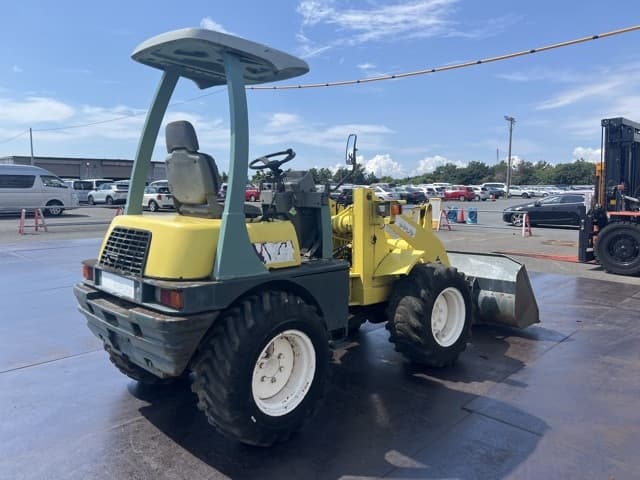 MINI WHEEL LOADER — Auction (lot 8457-40001)