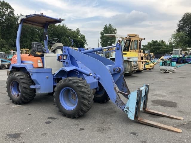 MINI WHEEL LOADER — Auction (lot 8457-458)