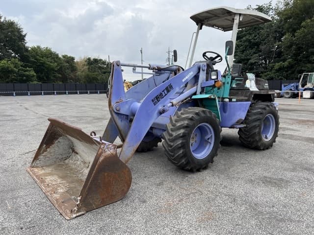 MINI WHEEL LOADER — Auction (lot 8457-504)