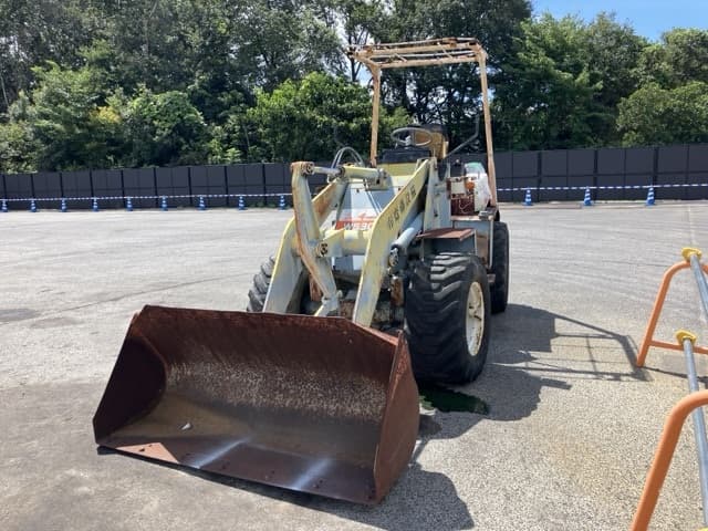MINI WHEEL LOADER — Auction (lot 8458-1815)