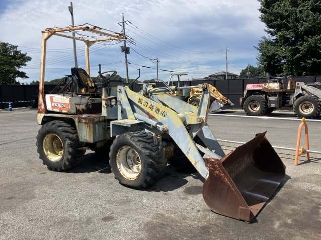 MINI WHEEL LOADER — Auction (lot 8458-1815)