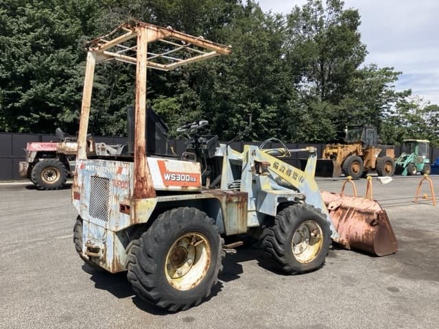 MINI WHEEL LOADER — Auction (lot 8458-1815)