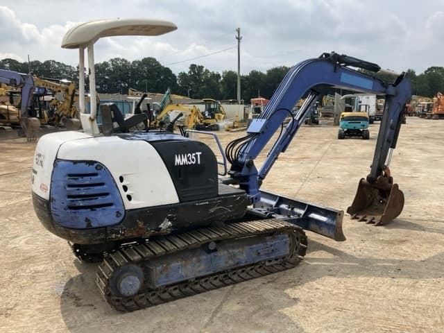 MINI EXCAVATOR — Auction (lot 8458-1828)