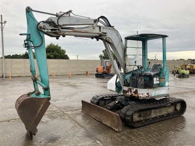 MINI EXCAVATOR — Auction (lot 8458-323)