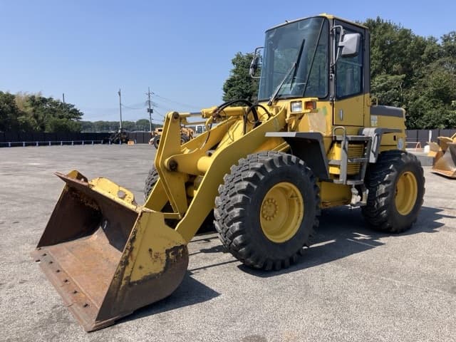 WHEEL LOADER — Auction (lot 8458-61)