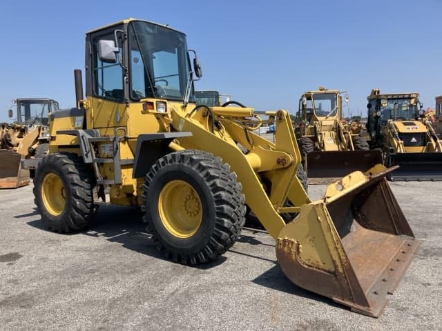 WHEEL LOADER — Auction (lot 8458-61)