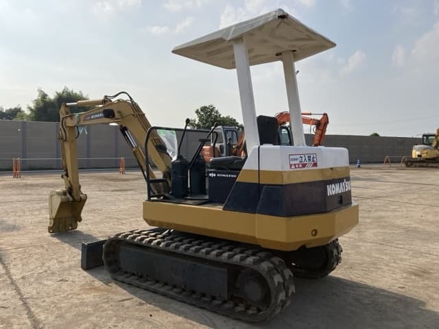 MINI EXCAVATOR — Auction (lot 8458-62)