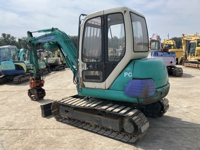 MINI EXCAVATOR — Auction (lot 8458-77)