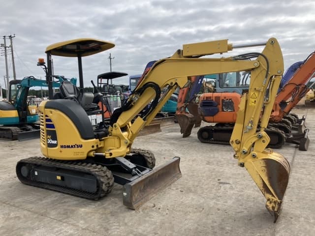 MINI EXCAVATOR — Auction (lot 8459-125)