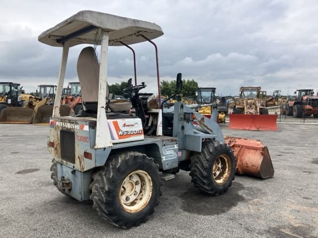MINI WHEEL LOADER — Auction (lot 8459-179)