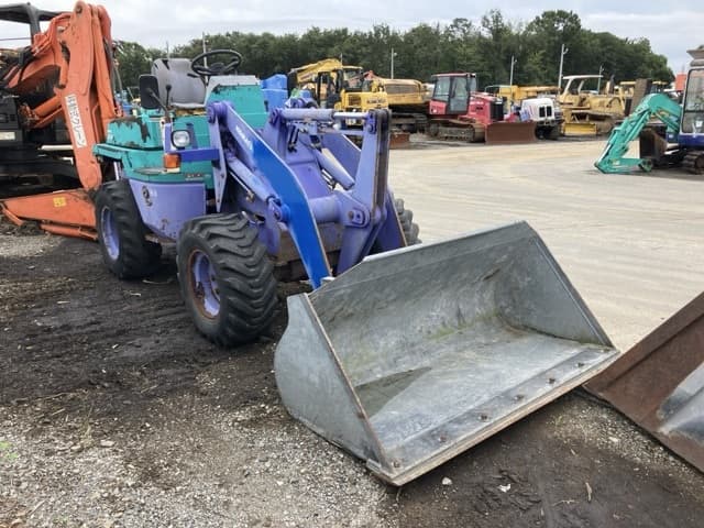 MINI WHEEL LOADER — Auction (lot 8459-1822)