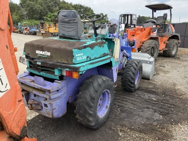 MINI WHEEL LOADER — Auction (lot 8459-1822)