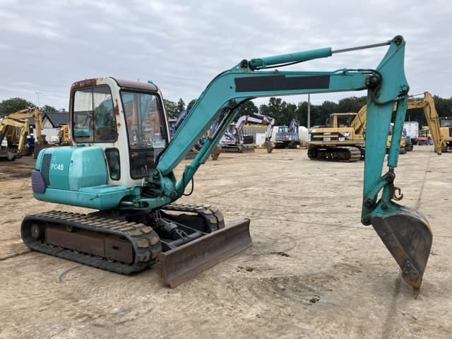 MINI EXCAVATOR — Auction (lot 8459-209)