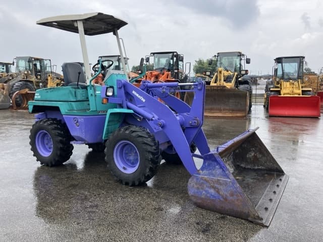 MINI WHEEL LOADER — Auction (lot 8459-373)