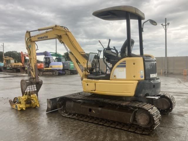 MINI EXCAVATOR — Auction (lot 8459-402)