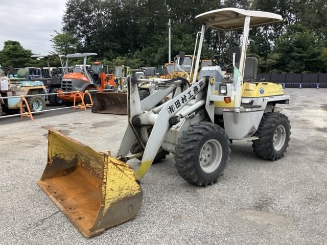 MINI WHEEL LOADER — Auction (lot 8459-60)