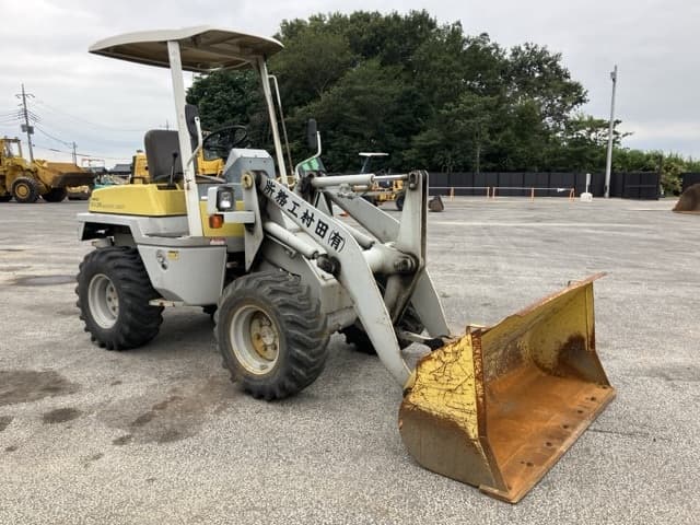 MINI WHEEL LOADER — Auction (lot 8459-60)