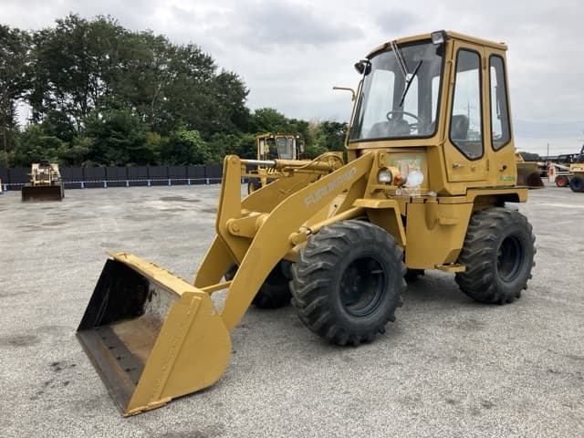 MINI WHEEL LOADER — Auction (lot 8459-64)