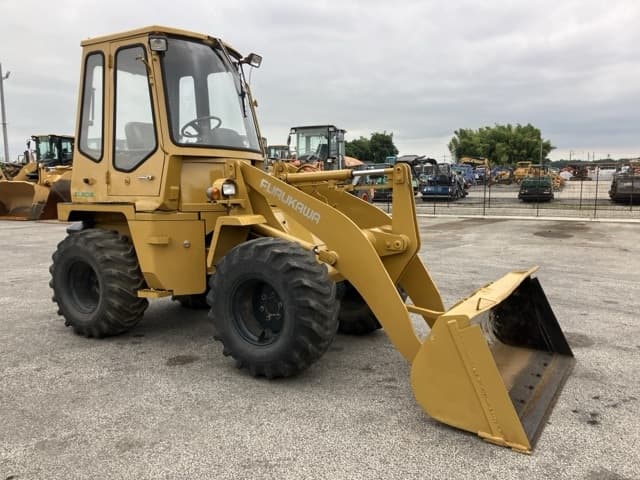 MINI WHEEL LOADER — Auction (lot 8459-64)