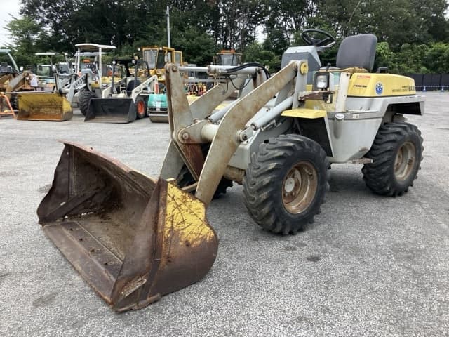 MINI WHEEL LOADER — Auction (lot 8459-65)