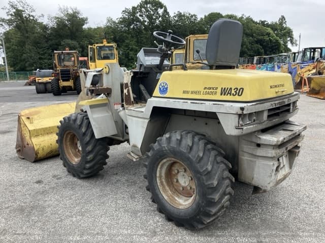 MINI WHEEL LOADER — Auction (lot 8459-65)