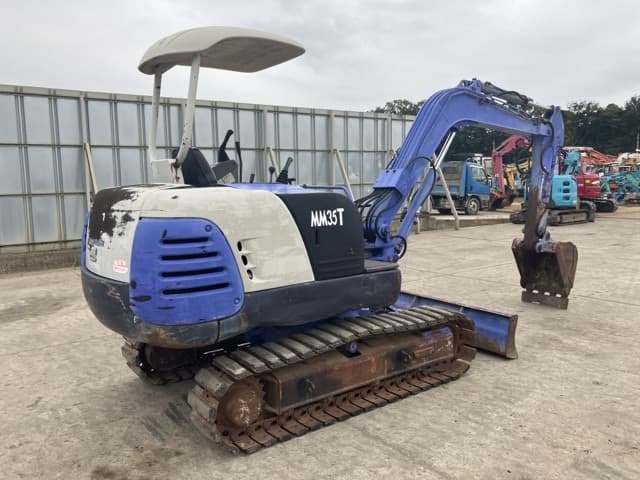 MINI EXCAVATOR — Auction (lot 8459-66)