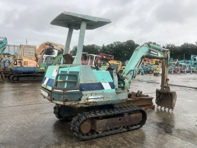 MINI EXCAVATOR — Auction (lot 8460-157)
