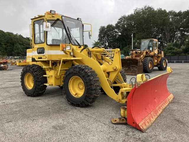 WHEEL LOADER — Auction (lot 8460-401)