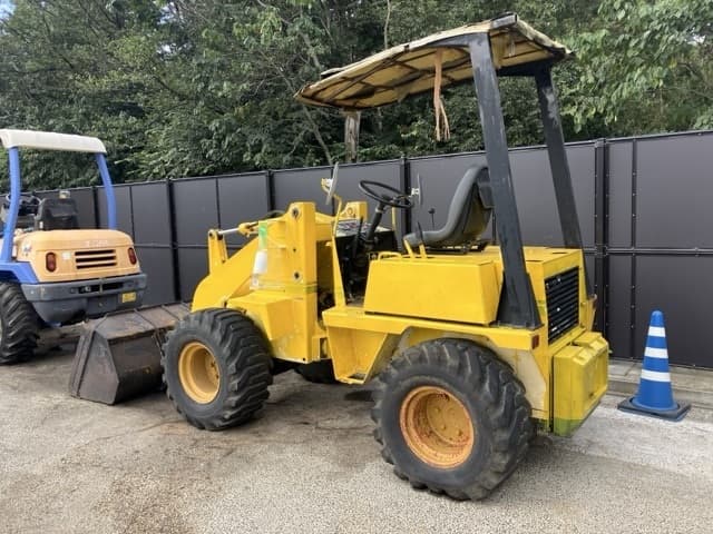 MINI WHEEL LOADER — Auction (lot 8461-1823)