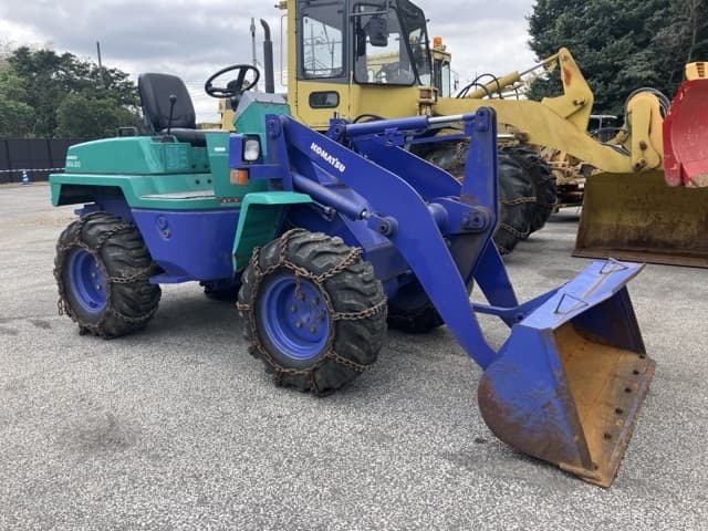 MINI WHEEL LOADER — Auction (lot 8461-323)