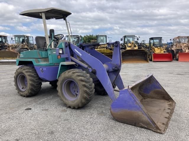 MINI WHEEL LOADER — Auction (lot 8461-397)