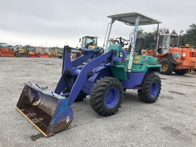 MINI WHEEL LOADER — Auction (lot 8461-70)